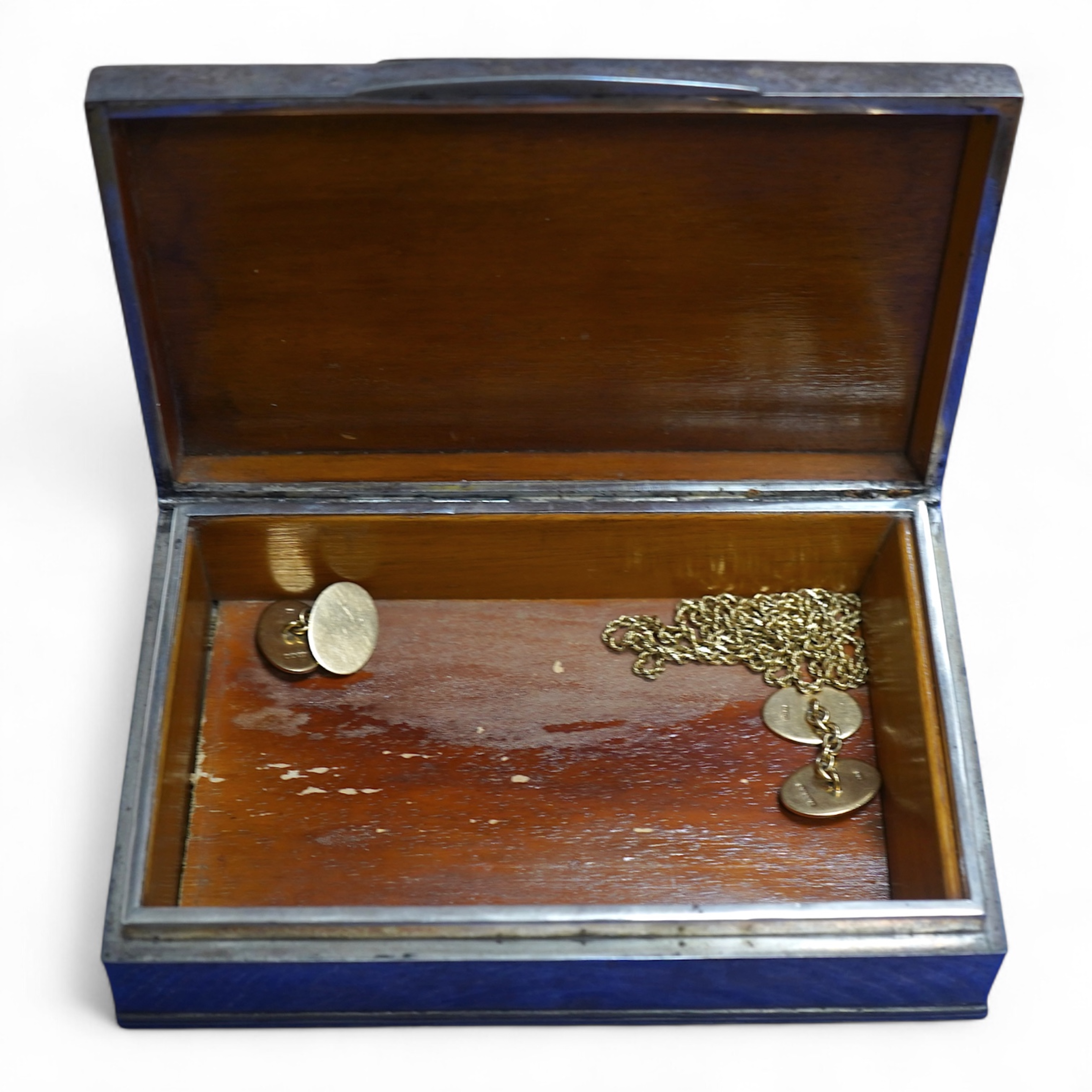 A pair of 9ct gold and seed pearl cufflinks, each end of oval outline, two accented with half pearls, to chain link connections, each end 1.9 x 1.3cm, British hallmarks, date letter for 1991, gross weight approximately 9